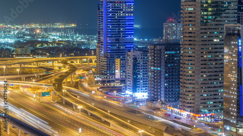 Aerial view of a sheikh zayed road intersection in a big city timelapse.