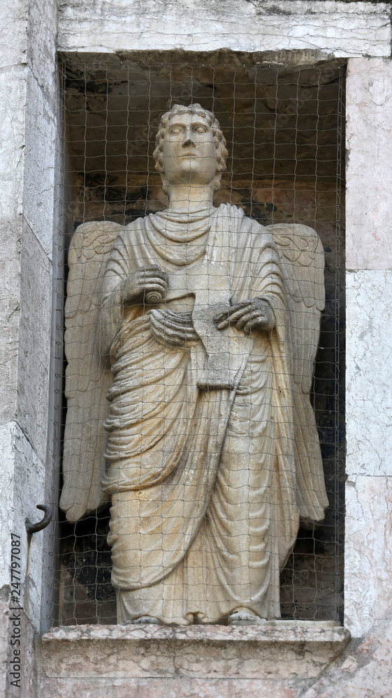 Angel, marble statue on the Baptistery, Parma Emilia-Romagna Italy