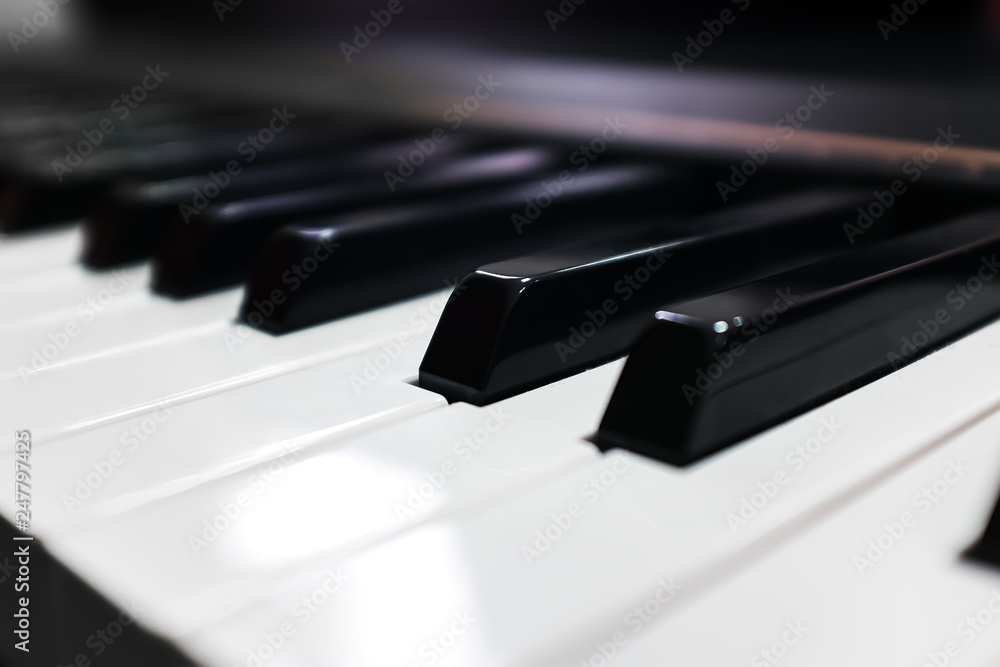 Keyboard synthesizer. Piano keyboard with selective focus. Classic piano.