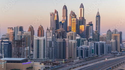 Dubai Marina towers during sunset aerial timelapse, United Arab Emirates