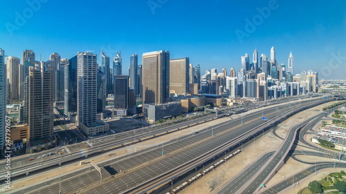 Dubai Marina skyscrapers aerial top view during all day from JLT in Dubai timelapse, UAE.