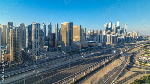 Dubai Marina skyscrapers aerial top view during all day from JLT in Dubai timelapse, UAE. © neiezhmakov