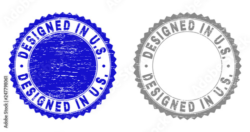 Grunge DESIGNED IN U.S. stamp seals isolated on a white background. Rosette seals with grunge texture in blue and grey colors. Vector rubber stamp imitation of DESIGNED IN U.S.