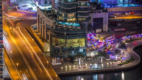 Luxury Dubai Marina canal and promenade night timelapse, Dubai, United Arab Emirates