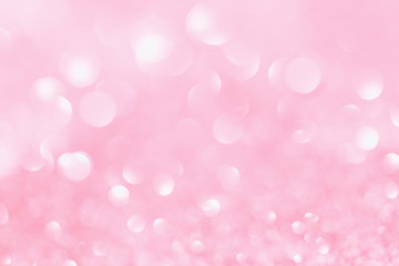 Abstract tender pink glitter light bokeh. Feminine holiday and festive party background