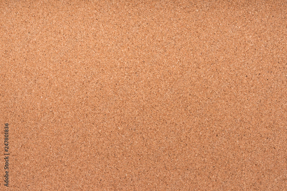 Brown textured cork board closeup for notes Brown textured cork board closeup for notes