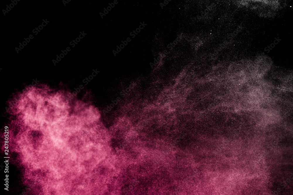 red powder effect splash for makeup artist or graphic design in black background