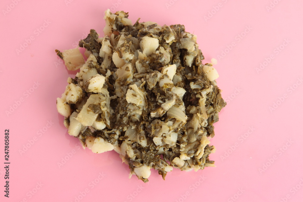 delicious chard with potato on pink background delicious chard with potato on pink background
