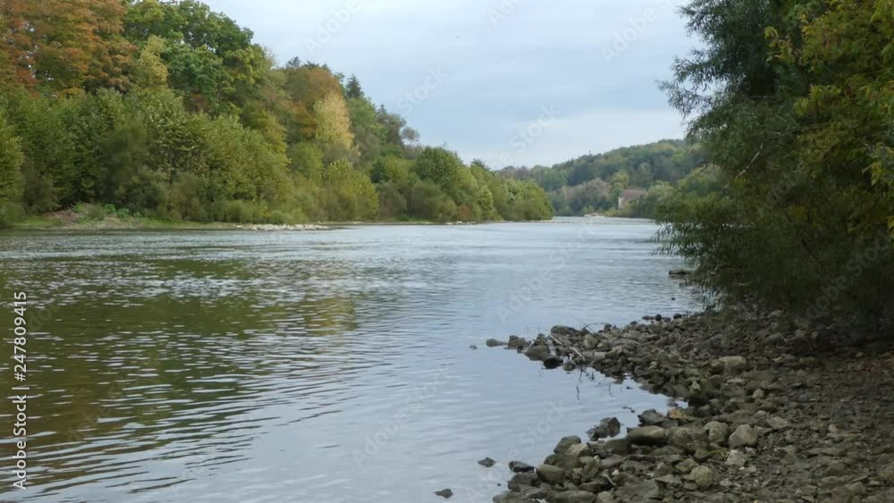 Water Lake Ripples With Rocks On One Side And Trees Forest On The Left Side Water Lake Ripples With Rocks On One Side And Trees Forest On The Left Side