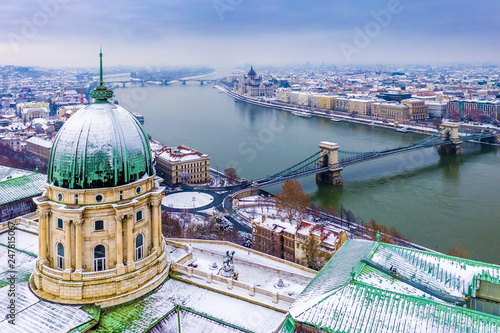 Photography Budapest, Hungary - Aerial view of the dome of snowy Buda Castle Royal Palace fr