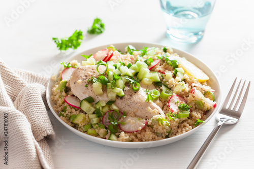 chicken breast with couscous, cucumber, avocado, spring onion, radish. healthy lunch
