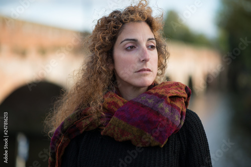 Εκτύπωση καμβά portrait of noble and proud beautiful woman with long red windswept curly hair a