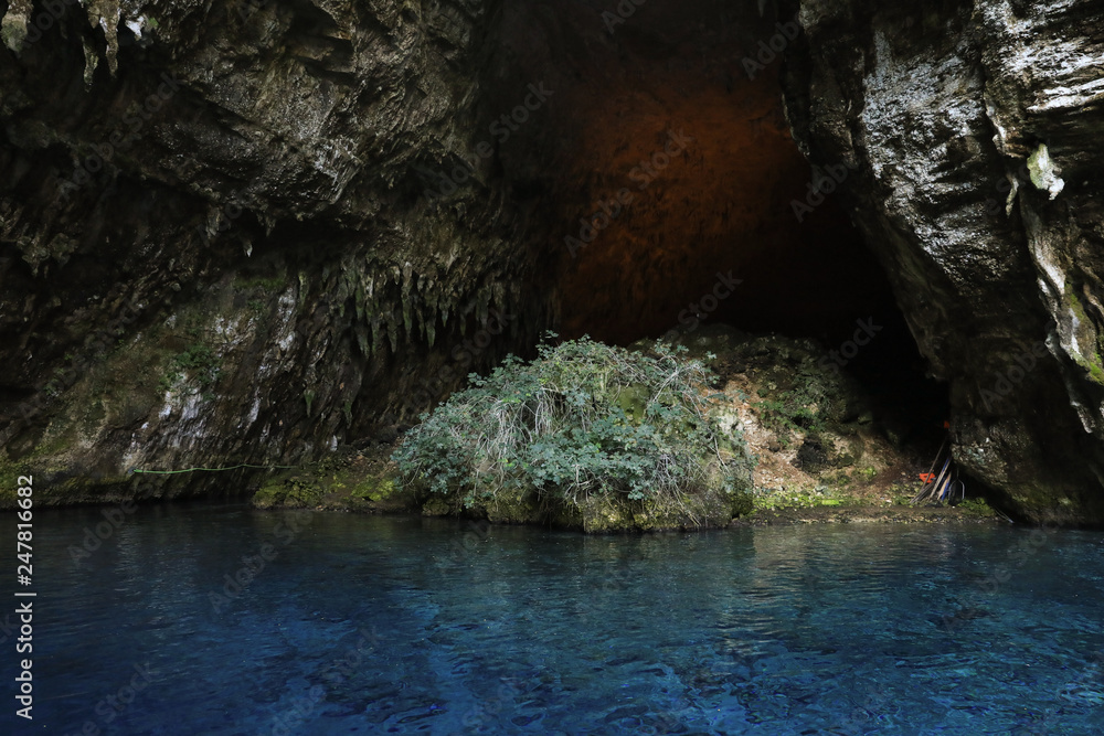 Covered part of the Melissani cave located on the island of Kefalonia, northwest of Sami town, Ionian Islands region, Greece. Covered part of the Melissani cave located on the island of Kefalonia, northwest of Sami town, Ionian Islands region, Greece.
