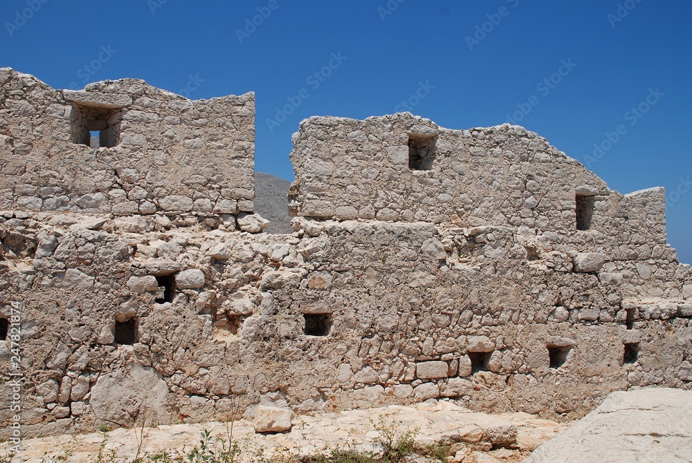 The remains of the medieval Crusader Knights castle above Chorio on the Greek island of Halki.