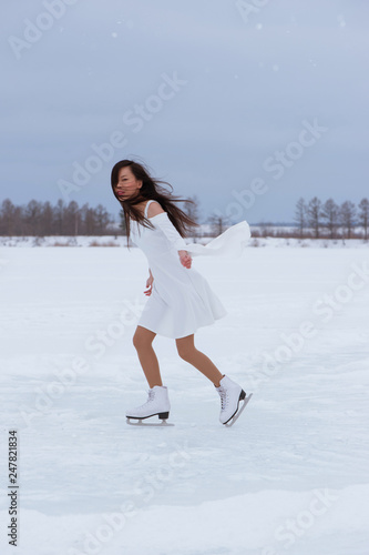 Pretty young woman on skates