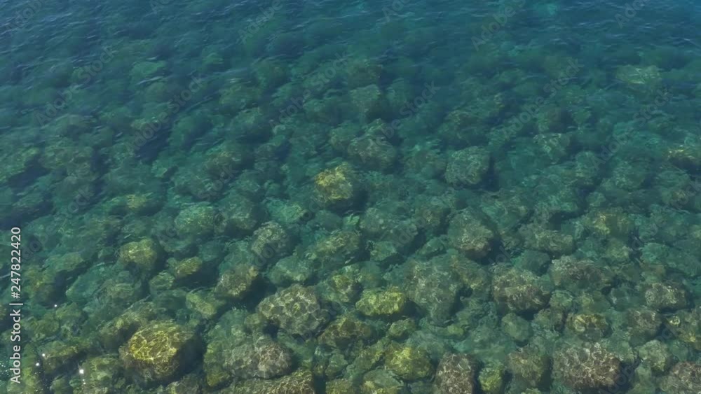 Clear, turquoise water of the Mediterranean sea and rocks. Amalfi Coast, Italy. Clear, turquoise water of the Mediterranean sea and rocks. Amalfi Coast, Italy.