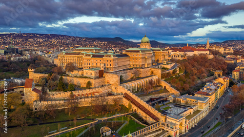 Budapest, Hungary - Aerial view of Buda Castle Royal Palace at sunrise with Matthias Church and Buda Tunnel at autumn