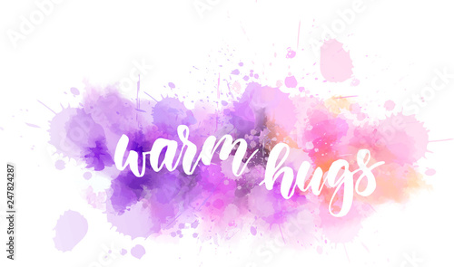 Warm hugs lettering on watercolor splash