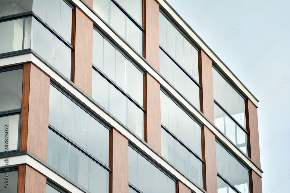 Abstract fragment of contemporary architecture, walls made of glass and concrete. Abstract fragment of contemporary architecture, walls made of glass and concrete.