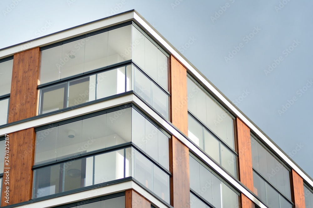Abstract fragment of contemporary architecture, walls made of glass and concrete. Abstract fragment of contemporary architecture, walls made of glass and concrete.
