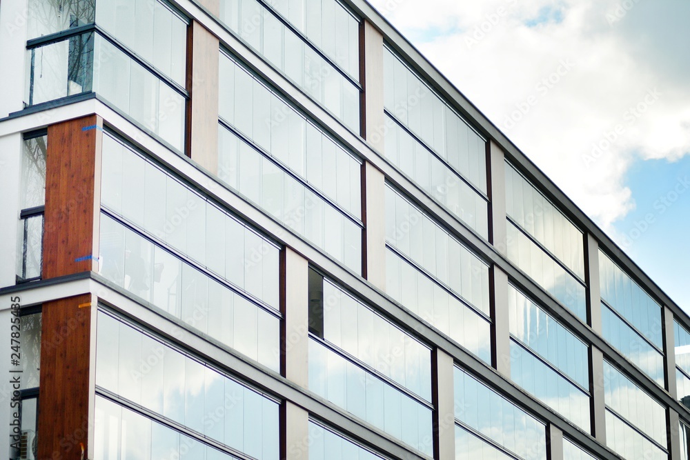Abstract fragment of contemporary architecture, walls made of glass and concrete. Abstract fragment of contemporary architecture, walls made of glass and concrete.