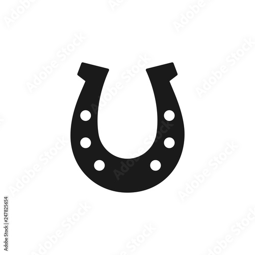 Black isolated icon of horseshoe on white background. Silhouette of horseshoe. Flat design. Symbol of luck.
