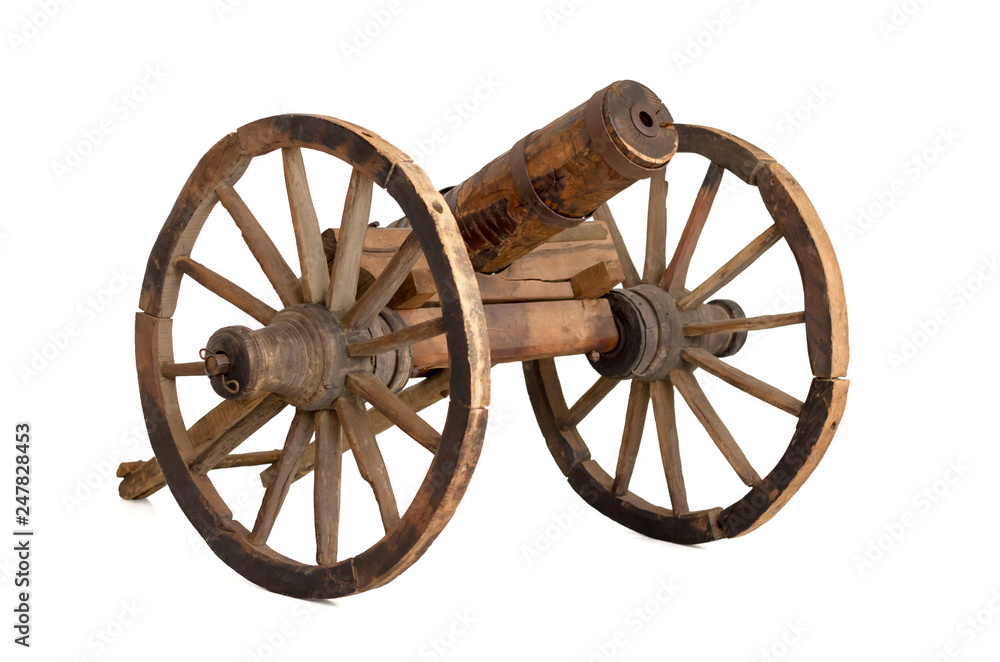 Ancient hand made wooden artillery cannon gun from Bulgarian-Turkish war, isolated on white background Ancient hand made wooden artillery cannon gun from Bulgarian-Turkish war, isolated on white background