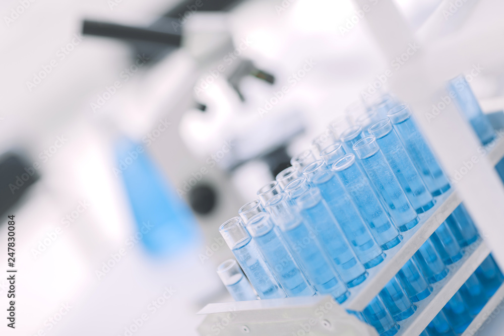 close up. tubes of blue liquid in the science lab close up. tubes of blue liquid in the science lab