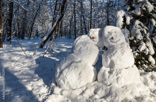 Beautiful snowmen love each other