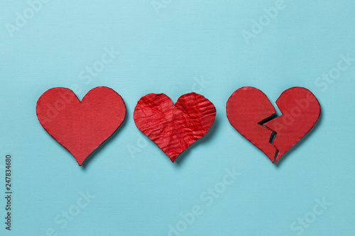 Valentine's Day. Three hearts on cyan background