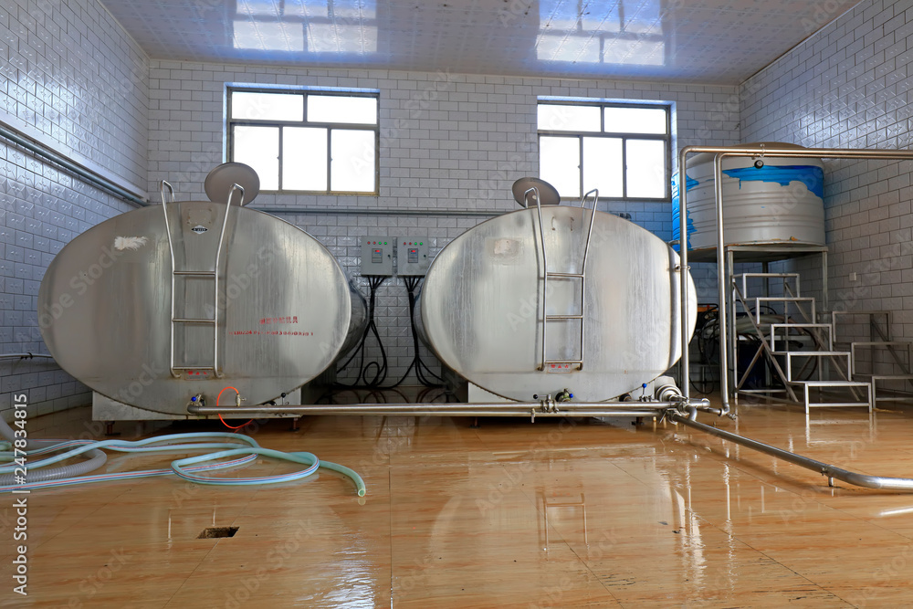 Milk storage tank in dairy farm Milk storage tank in dairy farm