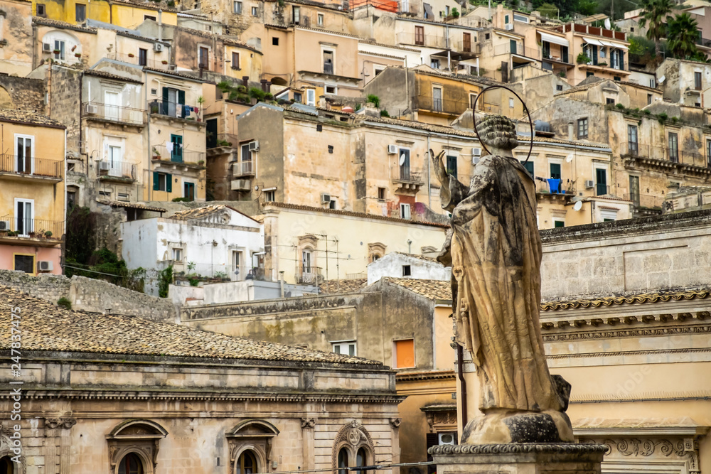 Back view of statue outside the Duomo of Saint Peter san pietro, Modica, Sicily