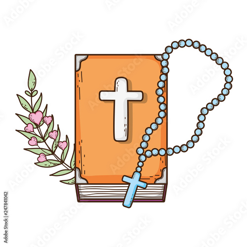 holy bible book with rosary