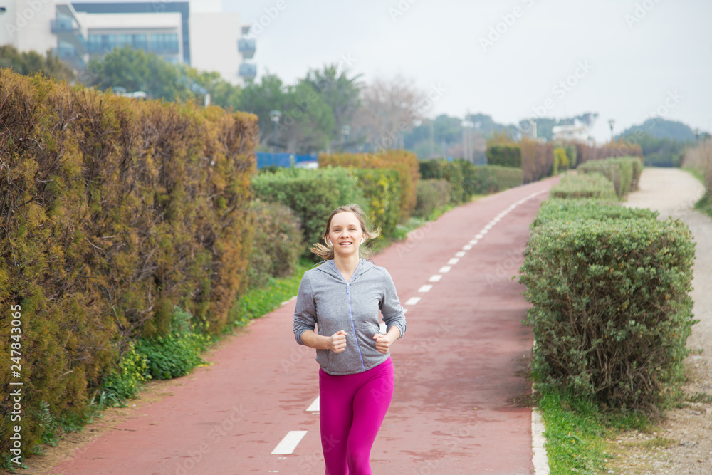 Content jogger enjoying morning run