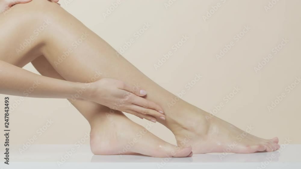 Beautiful female hands massaging legs and feet, recorded at Red Monstro using the light Briese HMI Focus 140. Beautiful female hands massaging legs and feet, recorded at Red Monstro using the light Briese HMI Focus 140.