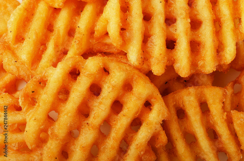 Crispy potato waffles fries, wavy, crinkle cut, criss cross cries photo