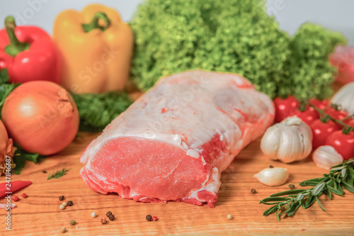 Juicy raw meat, beef entrecote on a white background, top view, close up. raw meat, cut part.  Ready to cook, for barbecue photo