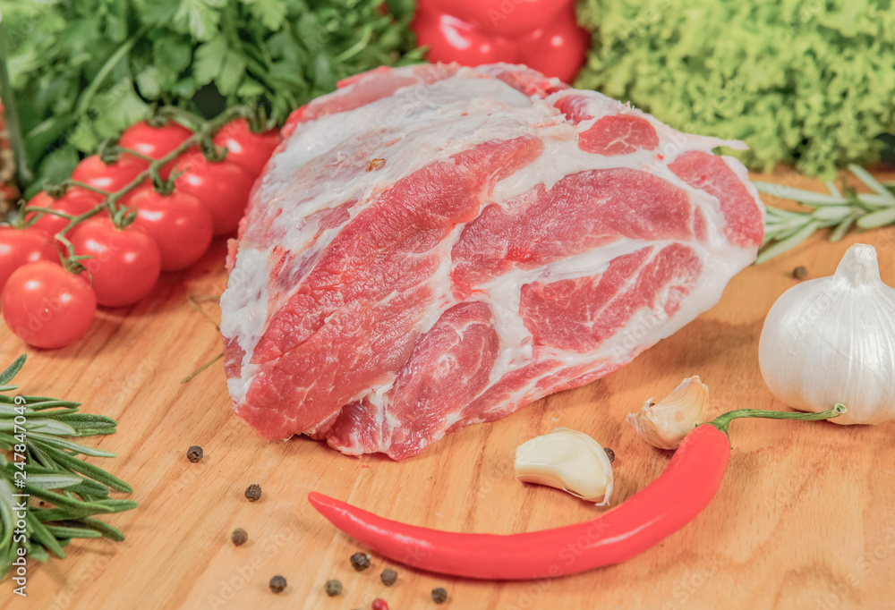 Juicy raw meat, beef entrecote on black background, top view