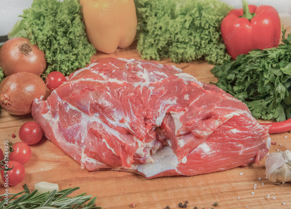 Juicy raw meat, beef entrecote on black background, top view Juicy raw meat, beef entrecote on black background, top view