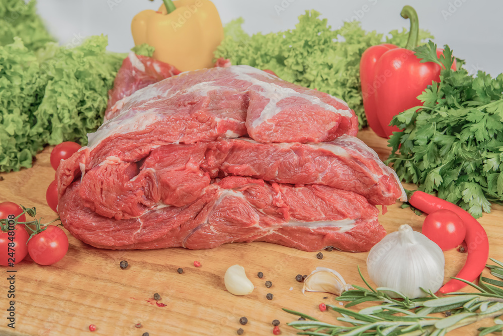 Juicy raw meat, beef entrecote on black background, top view Juicy raw meat, beef entrecote on black background, top view