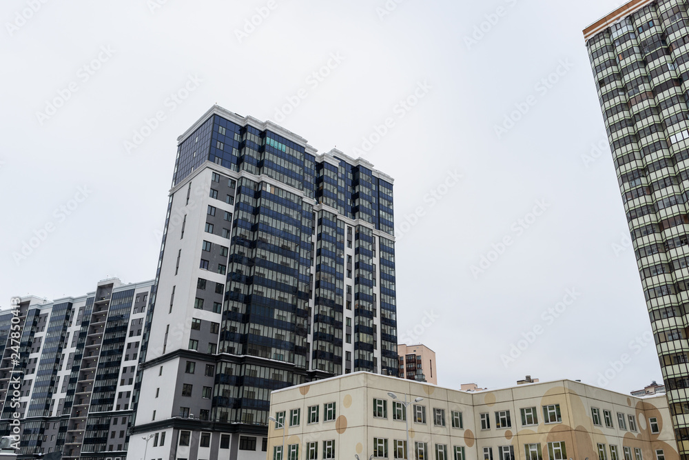 Naklejka premium New buildings. Apartment buildings. The problem of expensive housing.