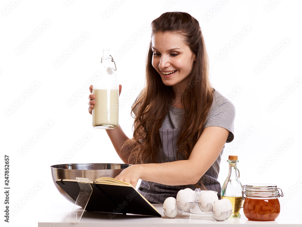 Portrait of beautiful chef home cook at home with dessert cupcakes homemade sweets Portrait of beautiful chef home cook at home with dessert cupcakes homemade sweets