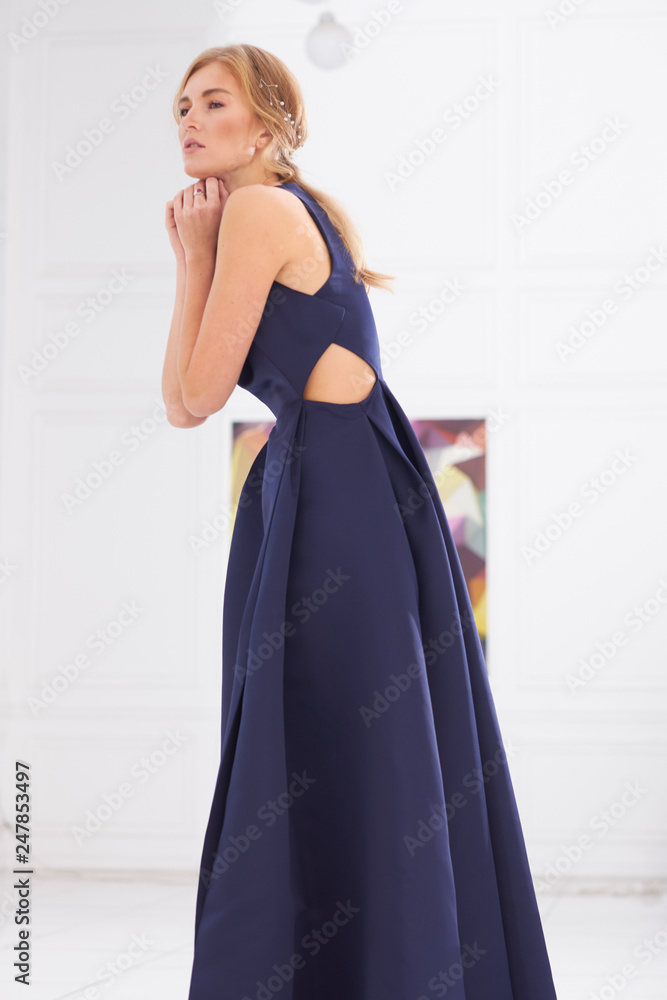 beautiful woman model posing in elegant dress in the studio beautiful woman model posing in elegant dress in the studio