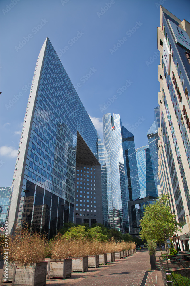 PARIS -MAY 30: La Defense - business district on May 30,2014 in Paris. La Defense is the biggest business district in France and most of companies have an office in this area. - Image