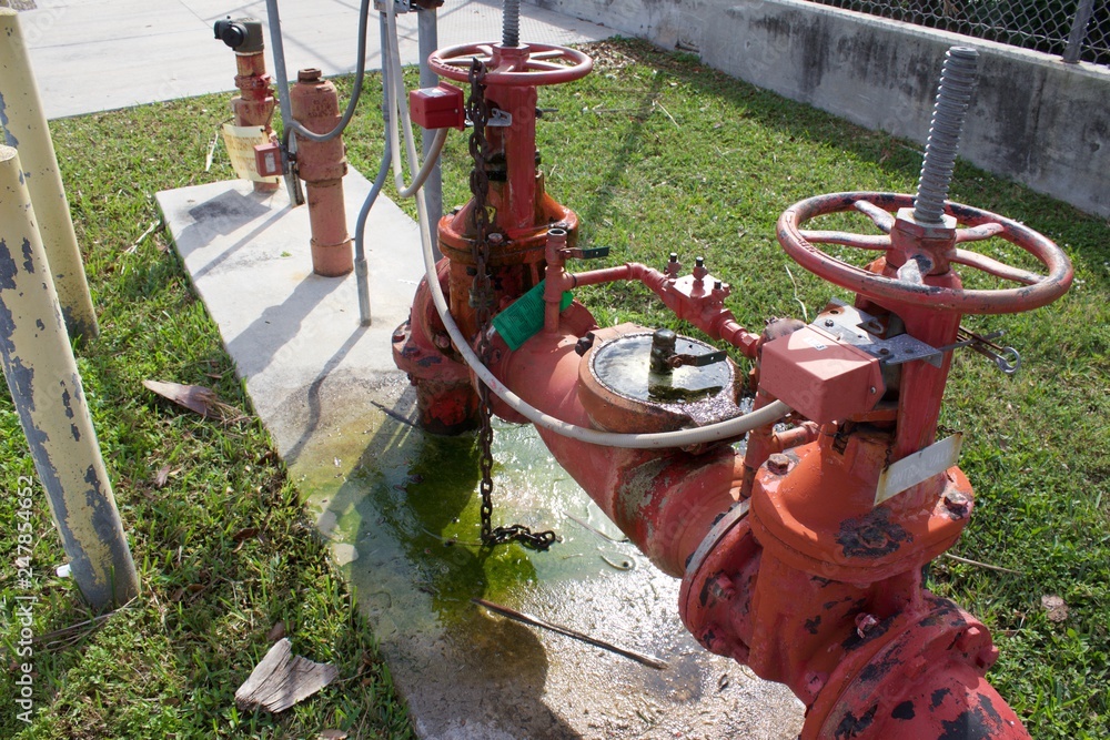 Gate valve leaking water, Red OS&Y valve leaking water from packing