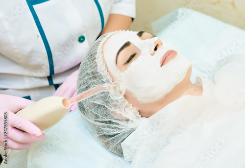 cosmetology room, treatment and skin cleansing with hardware, acne treatment, elimination of the causes of problem skin