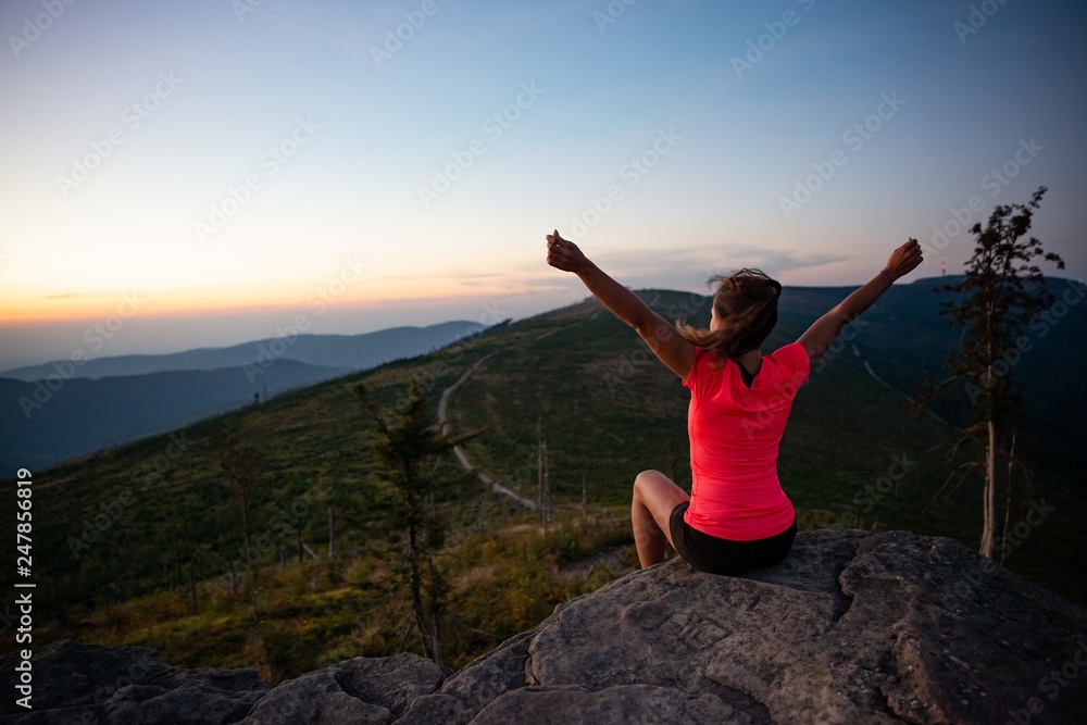 Woman cross country runner on mountain top at summer. Woman cross country runner on mountain top at summer.
