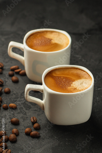 coffee freshly brewed in a white cup serving of beverage (coffee grain). food. top.copy save