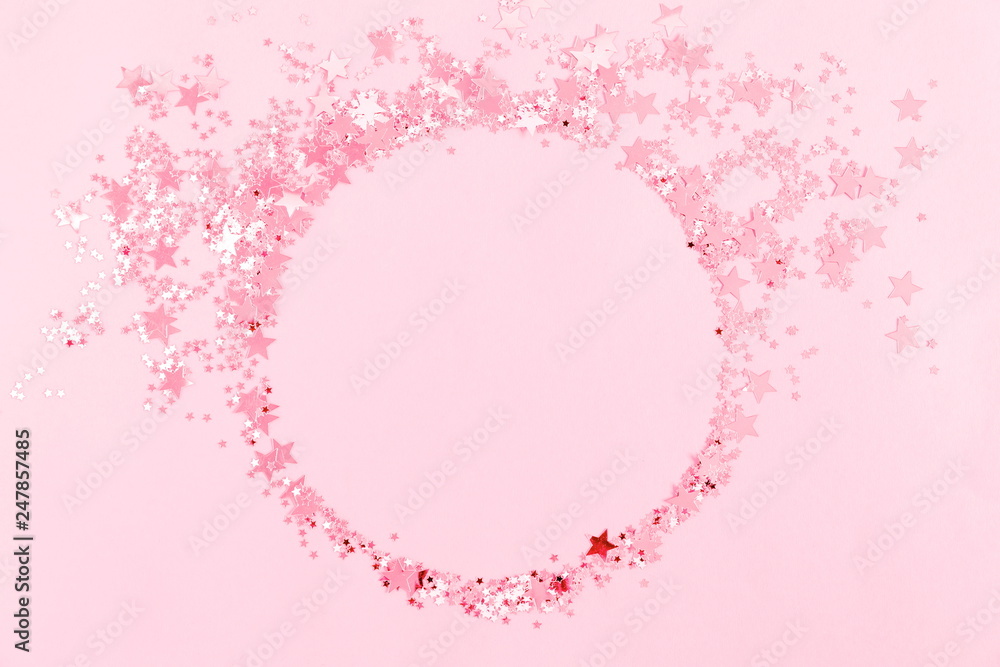 Festive pink background. Shining stars on light pink pastel background. Christmas. Wedding. Birthday. Happy woman's day. Mothers Day. Valentine's Day. Flat lay, top view, copy space