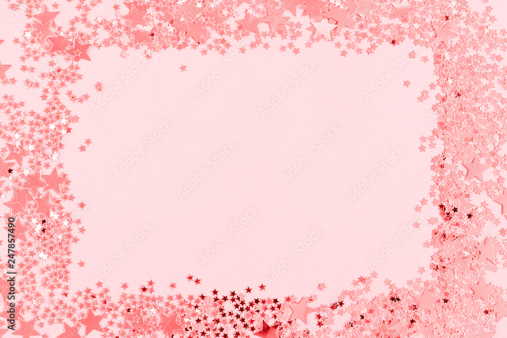 Festive pink background. Shining stars on light pink pastel background. Christmas. Wedding. Birthday. Happy woman's day. Mothers Day. Valentine's Day. Flat lay, top view, copy space